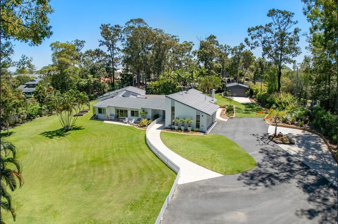 Concrete driveway leading to a garage